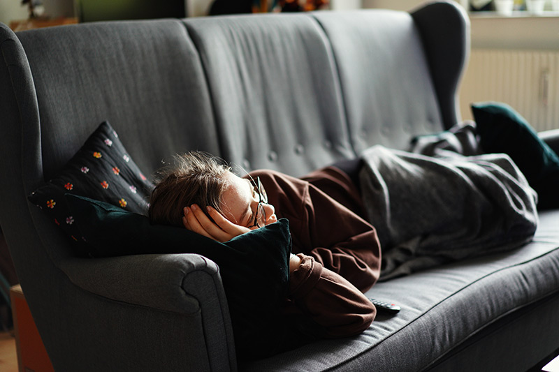 Girl laid on couch