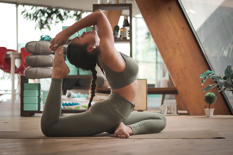 Lady practicing Yoga